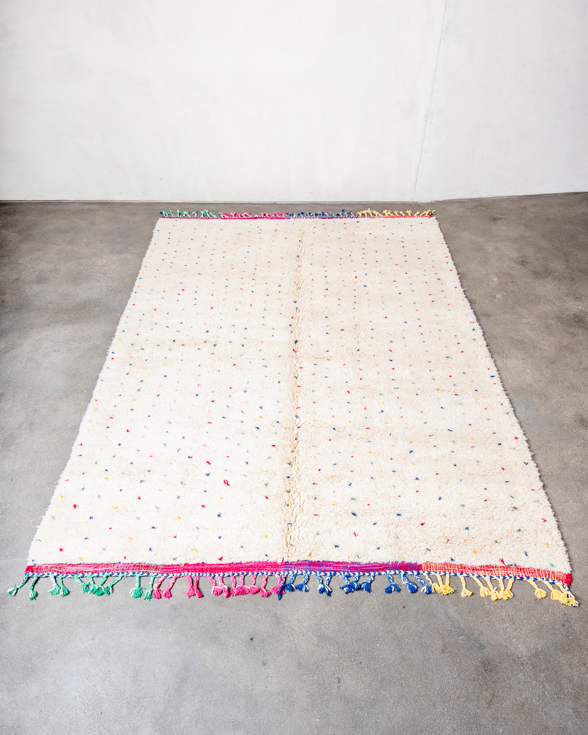 Modern, designer, handcrafted Berber rug from Morocco. Beniourain carpet with beautiful colours and patterns and fluffy wool texture.